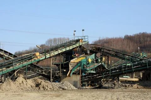 Elements of equipment for the extraction and sorting of rubble. Production .. Stock Photos
