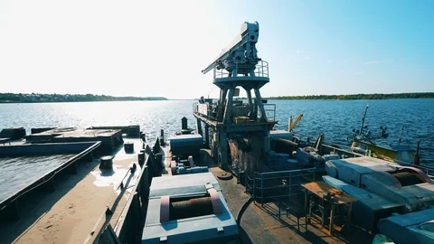 Elements of the excavation barge floating in the water Stock Footage 114697913