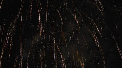 Elements of an explosion of fireworks in the night sky. Foto stock