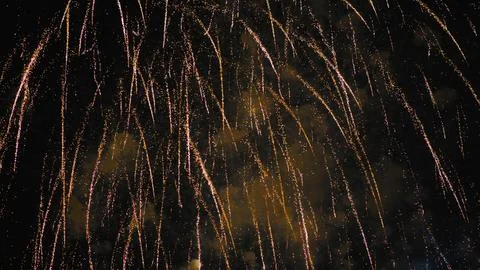 Elements of an explosion of fireworks in the night sky. Foto stock