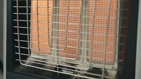 Elements of a gas heater heated from heating and a burning gas burner Stock-Footage 228718935