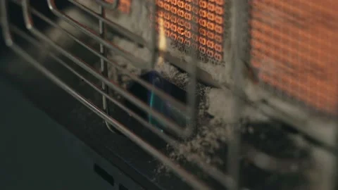 Elements of a gas heater heated from heating and a burning gas burner Stock-Footage 228767539