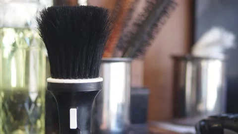Elements of a grooming setup with tools neatly arranged on a counter Stock Footage 345967189