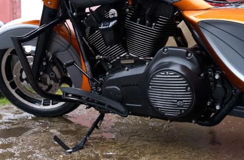 Elements of a Harley-Davidson motorcycle, engine, gearbox, wheel. Stock Photos