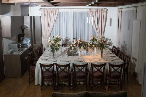 Elements home decorations. Festive table decorations, flowers and tableware Stock Photos
