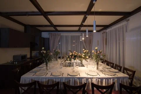 Elements home decorations. Festive table decorations, flowers and tableware Stock Photos