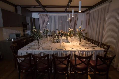 Elements home decorations. Festive table decorations, flowers and tableware Stock Photos
