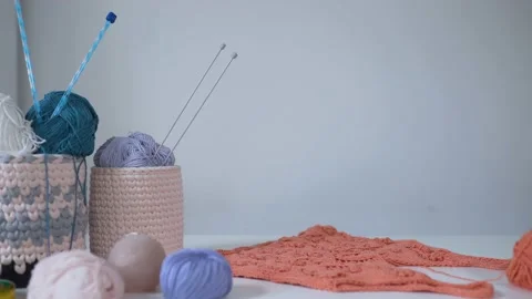 Elements of knitting on the white table Stock Footage 131237832