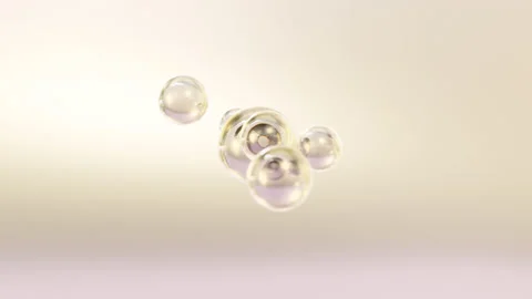 The elements of Macro Shots combine to create a serum. 動画素材 235329732