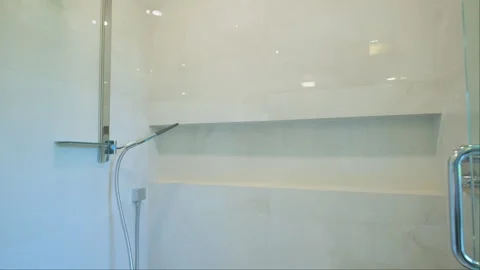 Elements of Modern Tiled Bathroom with Shower in home, real estate interior Stock Footage 253215348