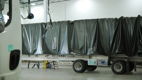 Elements of a repair workshop, Various devices and semi truck in a repair shop. Stock Footage 282322139