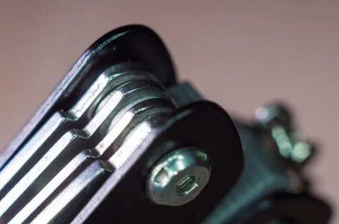 Elements small foldable steel multitool, close up, macro Foto stock