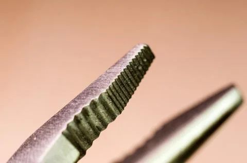 Elements small foldable steel multitool, close up, macro Stock Photos