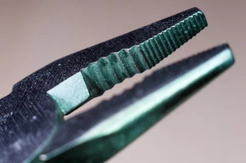 Elements small foldable steel multitool, close up, macro Stock Photos