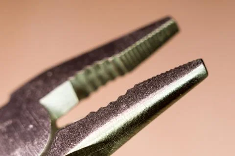 Elements small foldable steel multitool, close up, macro Stock Photos