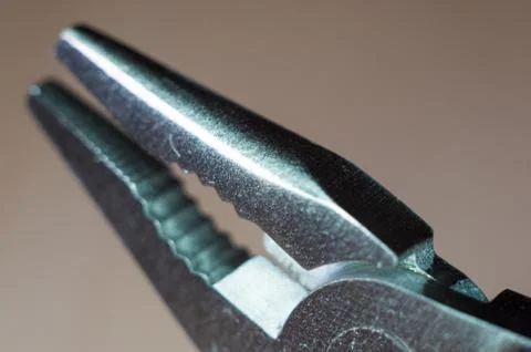 Elements small foldable steel multitool, close up, macro Foto stock