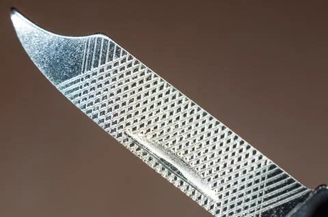 Elements small foldable steel multitool, close up, macro Foto stock