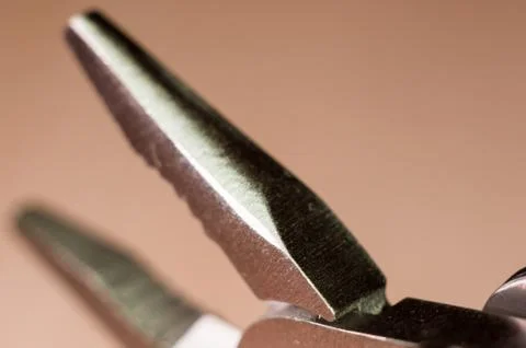 Elements small foldable steel multitool, close up, macro Stock Photos