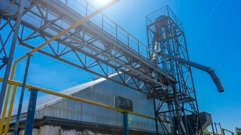 Elements of the structure of the old elevator and granary. Complex for storin Stock Photos