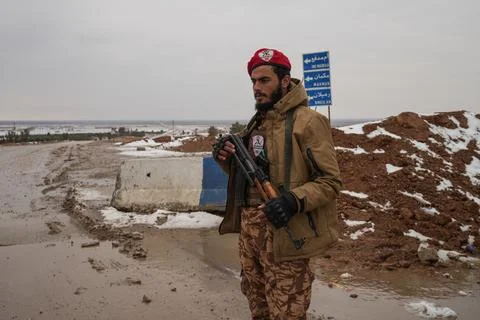 Elements of the Syrian army deploy near the front lines with the Syrian Democrat Stock Photos