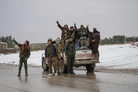 Elements of the Syrian army deploy near the front lines with the Syrian Democrat Stock Photos
