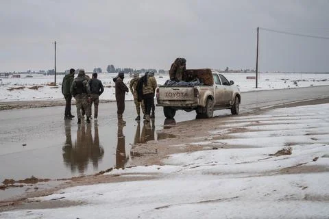 Elements of the Syrian army deploy near the front lines with the Syrian Democrat Stock Photos