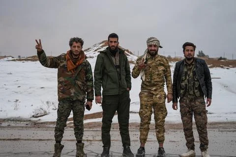 Elements of the Syrian army deploy near the front lines with the Syrian Democrat Stock Photos