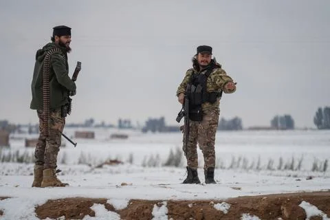 Elements of the Syrian army deploy near the front lines with the Syrian Democrat Stock Photos