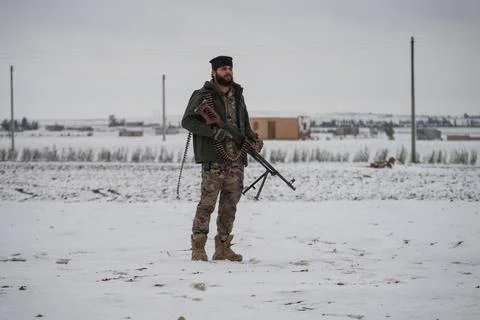 Elements of the Syrian army deploy near the front lines with the Syrian Democrat Stock Photos