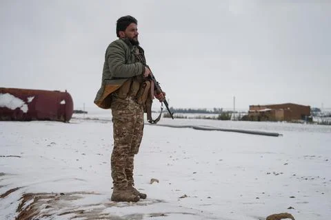 Elements of the Syrian army deploy near the front lines with the Syrian Democrat Stock Photos