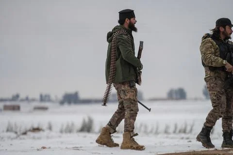 Elements of the Syrian army deploy near the front lines with the Syrian Democrat Stock Photos