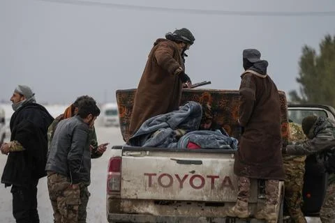 Elements of the Syrian army deploy near the front lines with the Syrian Democrat Stock Photos