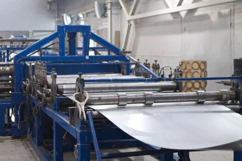 Elements of various sections of the galvanized steel processing line in rolls Fotos Stock