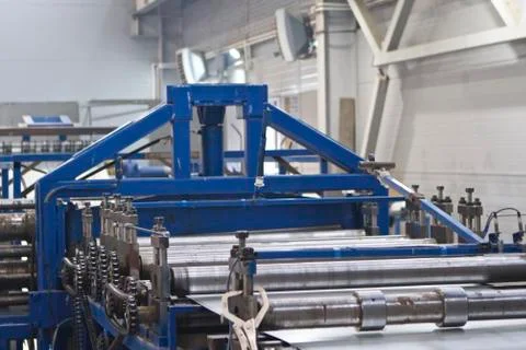 Elements of various sections of the galvanized steel processing line in rolls Fotos Stock