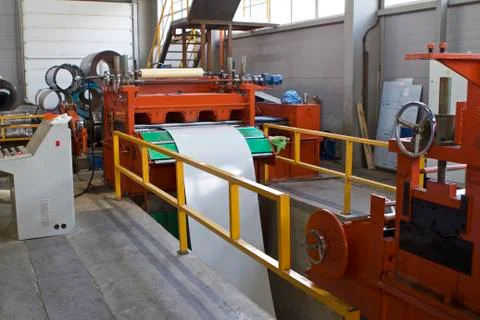 Elements of various sections of the galvanized steel processing line in rolls Fotos Stock