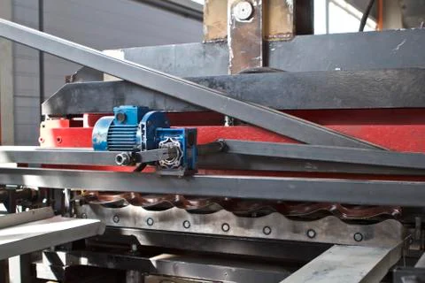 Elements of various sections of the galvanized steel processing line in rolls Fotos Stock