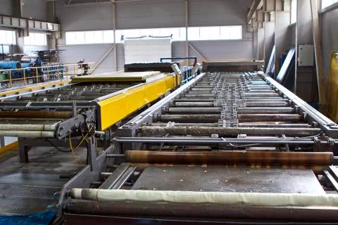 Elements of various sections of the galvanized steel processing line in rolls Fotos Stock