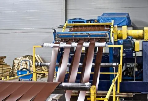 Elements of various sections of the galvanized steel processing line in rolls Fotos Stock