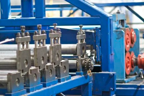 Elements of various sections of the galvanized steel processing line in rolls Fotos Stock