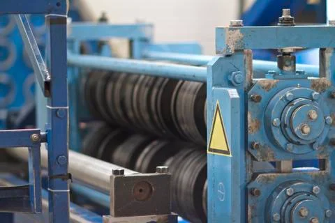 Elements of various sections of the galvanized steel processing line in rolls Fotos Stock