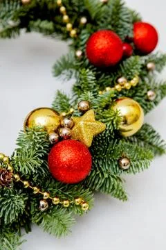 Elements of winter wreath of pine needles decoration red and golden Christmas Stock Photos