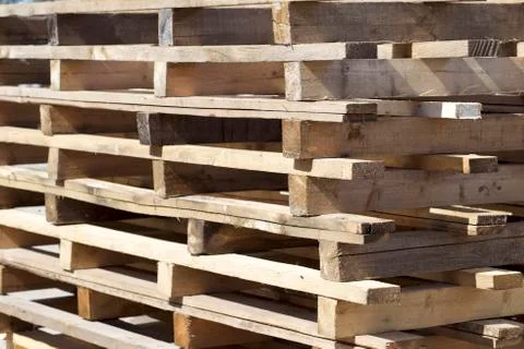 Elements of wooden pallets for loading and unloading cargo 库存照片