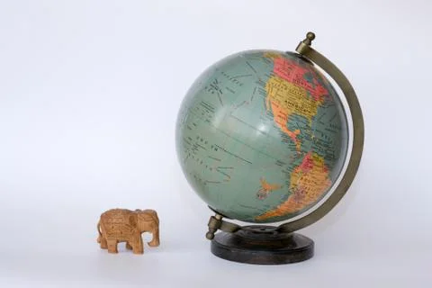 Elephant and globe Stock Photos