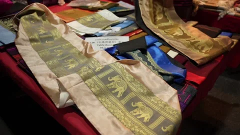 Elephant Embroidered Table Runner on Display at Night Market in Thailand Stock Footage 234852893