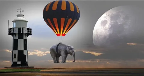 Elephant parachute passing through the light house Stock Footage 157669073