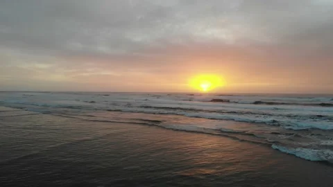 Elevate and Hold over Surf into Sunset Video stock 145235254