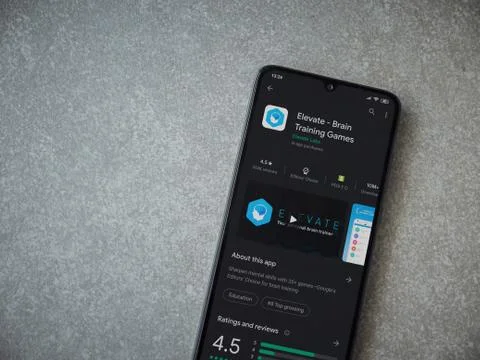 Elevate - Brain training games app play store page on the display of a black  Stock Photos