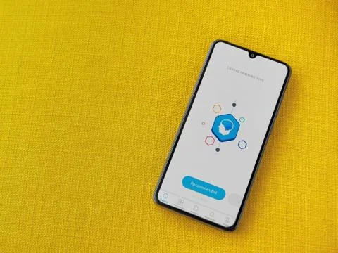 Elevate - Brain training games app launch screen with logo on the display of  Stock Photos