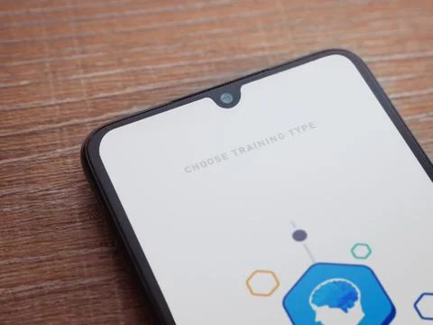 Elevate - Brain training games app launch screen with logo on the display of  Stock Photos
