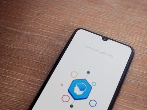 Elevate - Brain training games app launch screen with logo on the display of  Stock Photos